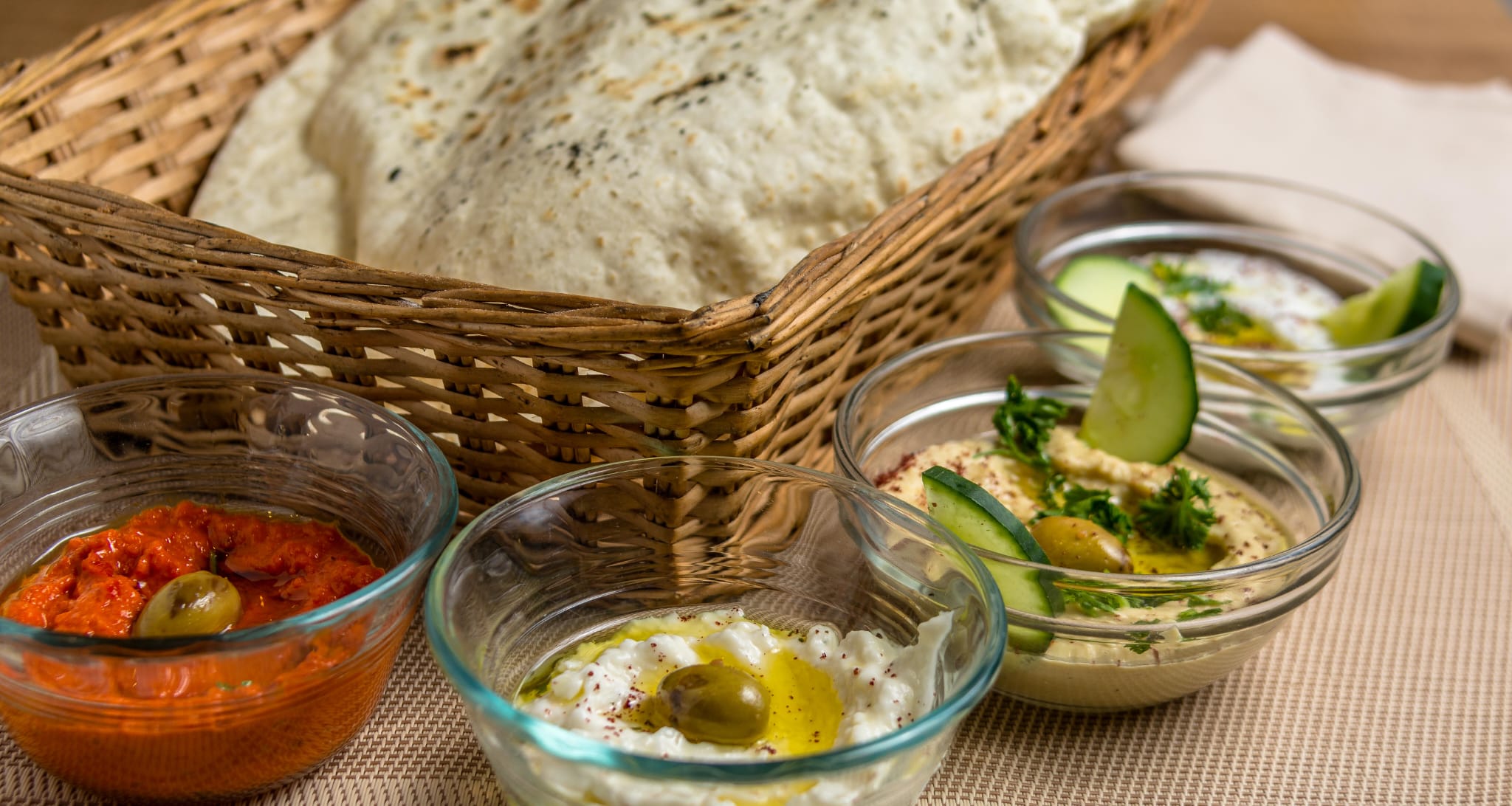 HOMEMADE PITA AND 4 DIPS Dish